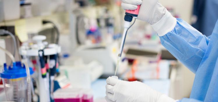 person working in a brightly lit laboratory